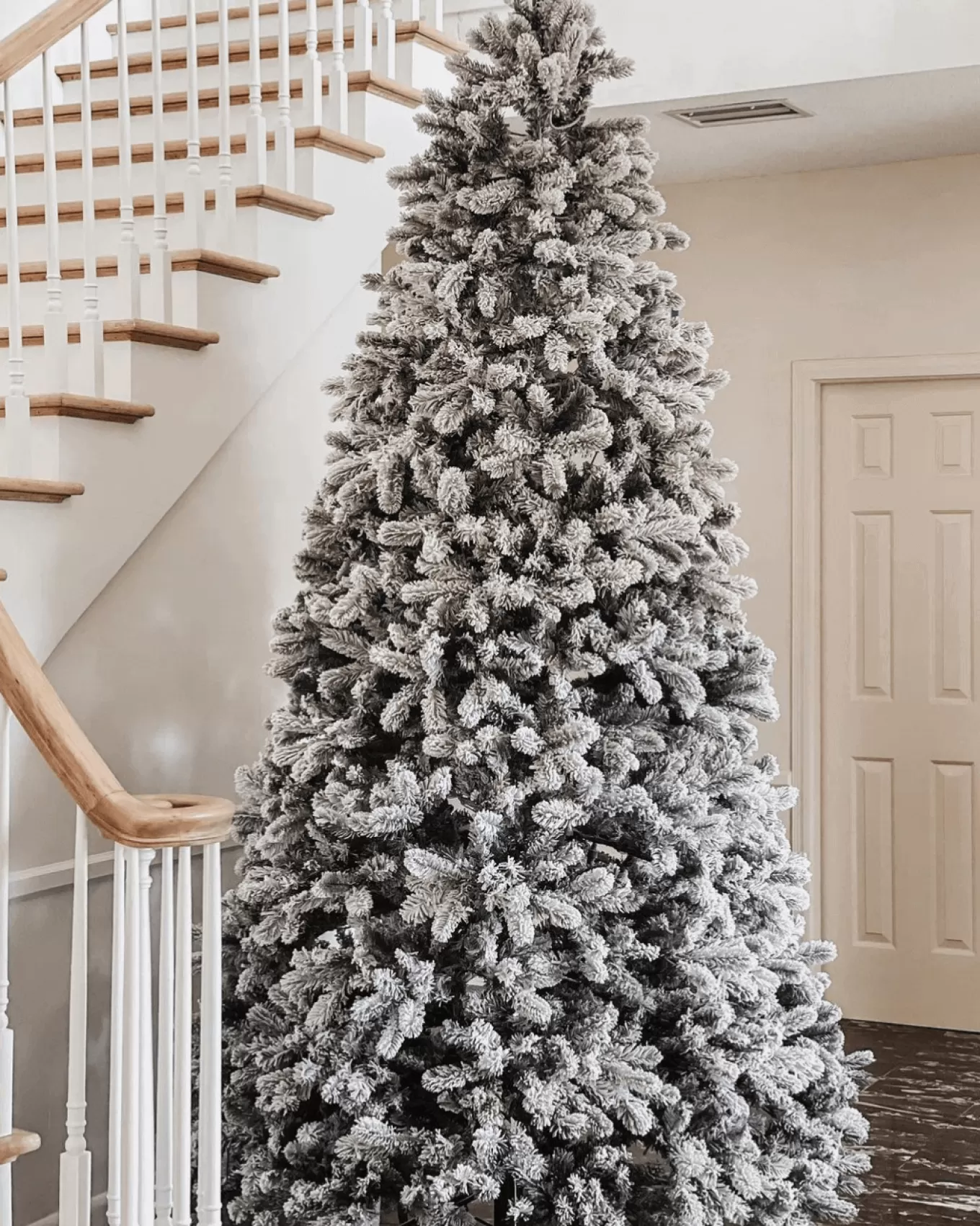 King Of Christmas 9' King Flock® Artificial Christmas Tree With 1100 Warm White LED Lights- Realistic | Pre-Lit
